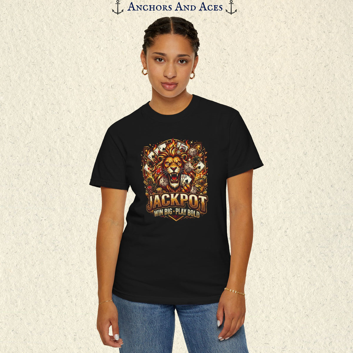 Man wearing a Black Jackpot Lion T-shirt with a crowned lion casino graphic featuring playing cards, poker chips, and jackpot details.