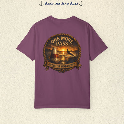 Berry purple vintage slalom water ski T-shirt shown from the back with a sunrise lake graphic featuring a slalom buoy, water skier, rope border, and the text One More Pass and Before the Wind Finds Us.