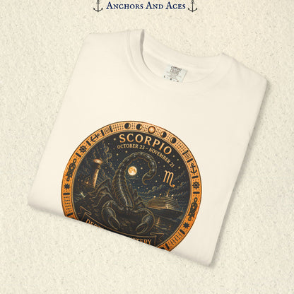 Folded Scorpio zodiac shirt close-up showing scorpion celestial medallion and Depths of Mystery artwork