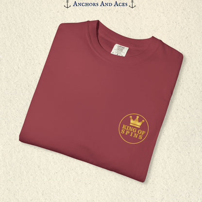 Folded Chili Slot King T-shirt showing the small gold King of Spins chest emblem.