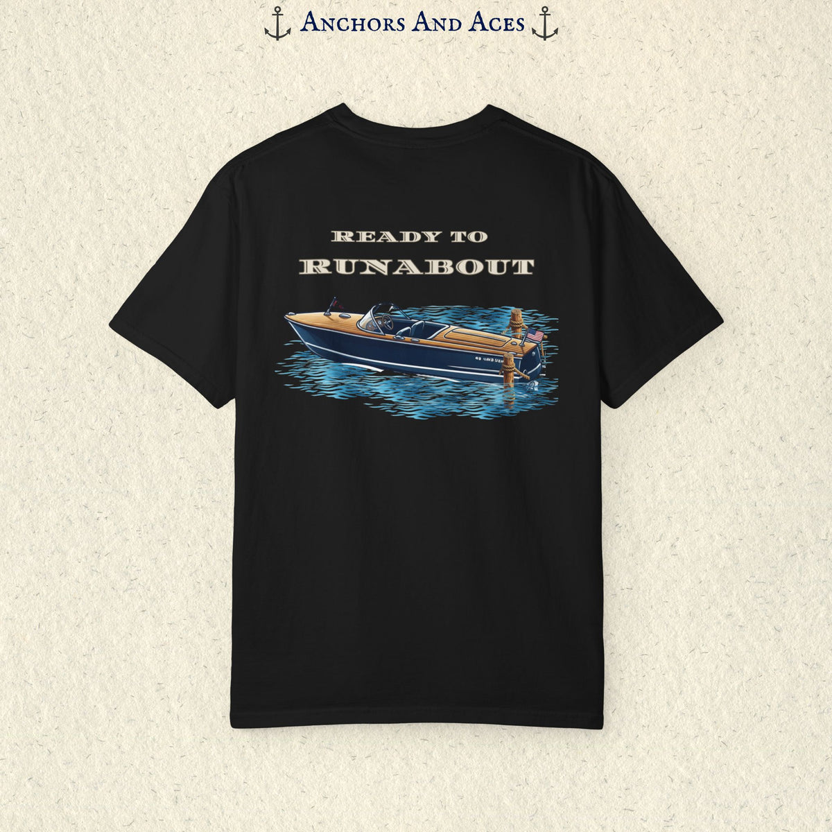 Black classic wooden boat T-shirt shown from the back, featuring a vintage runabout on reflective blue water with Ready to Runabout text above the boat.