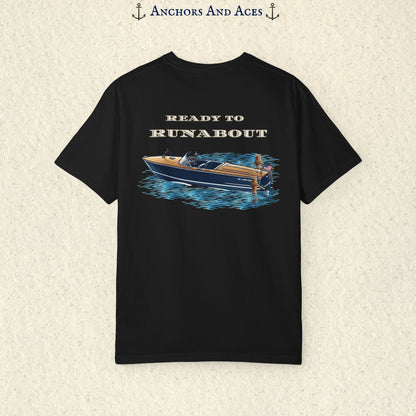 Black classic wooden boat T-shirt shown from the back, featuring a vintage runabout on reflective blue water with Ready to Runabout text above the boat.