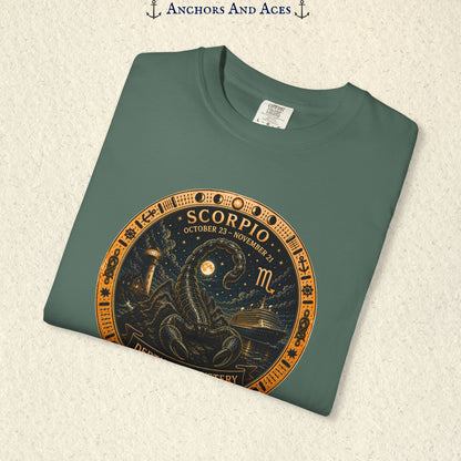 Folded Scorpio zodiac shirt close-up showing scorpion celestial medallion and Depths of Mystery artwork