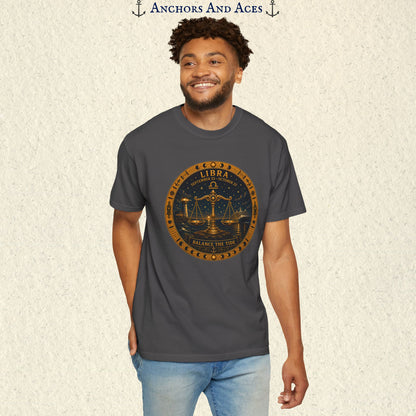 Male model wearing the Libra Zodiac Shirt with the full-size balance scales celestial medallion graphic on the front.