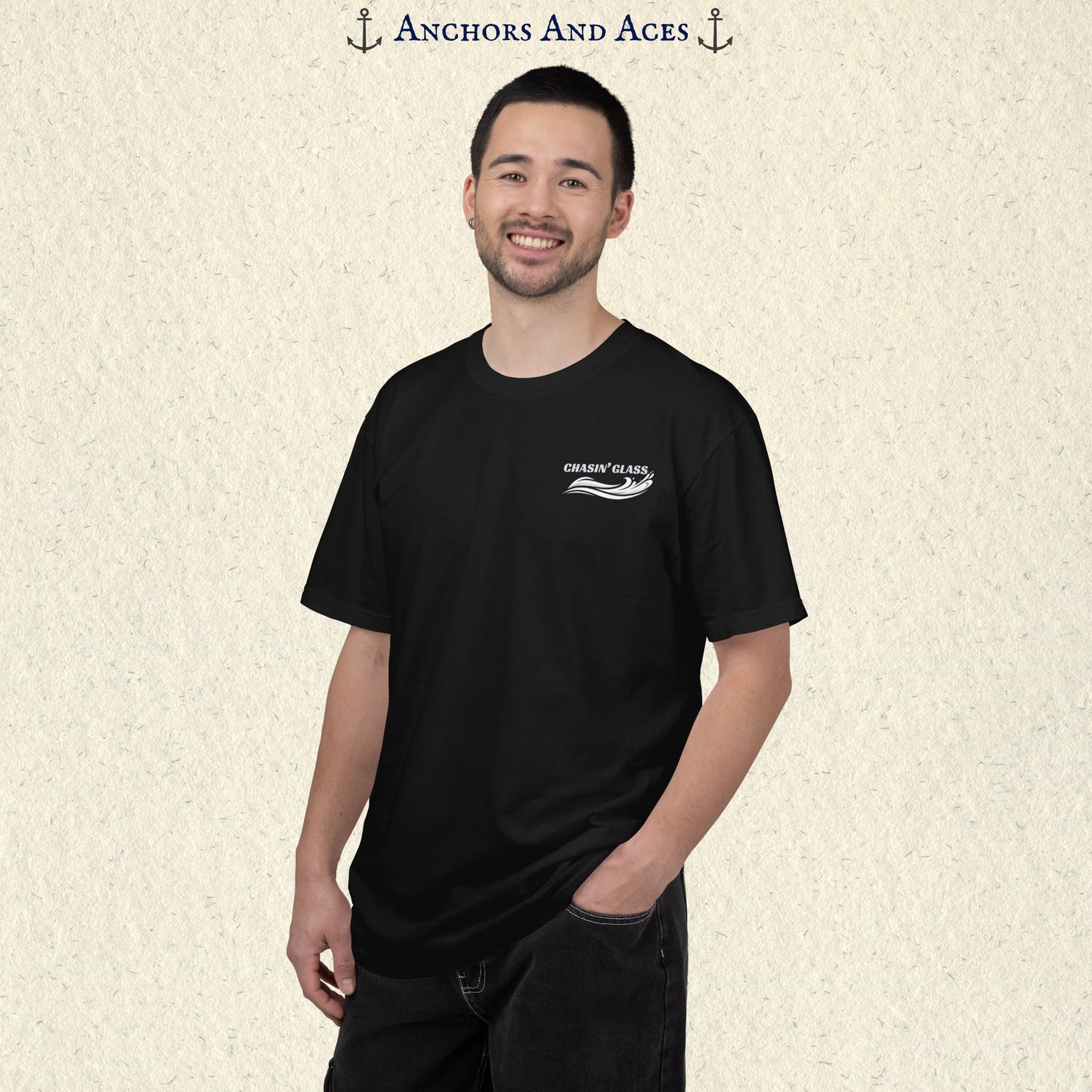 Model wearing a Ivory T-shirt from the front, showing the small white Chasin' Glass water splash logo on the left chest.