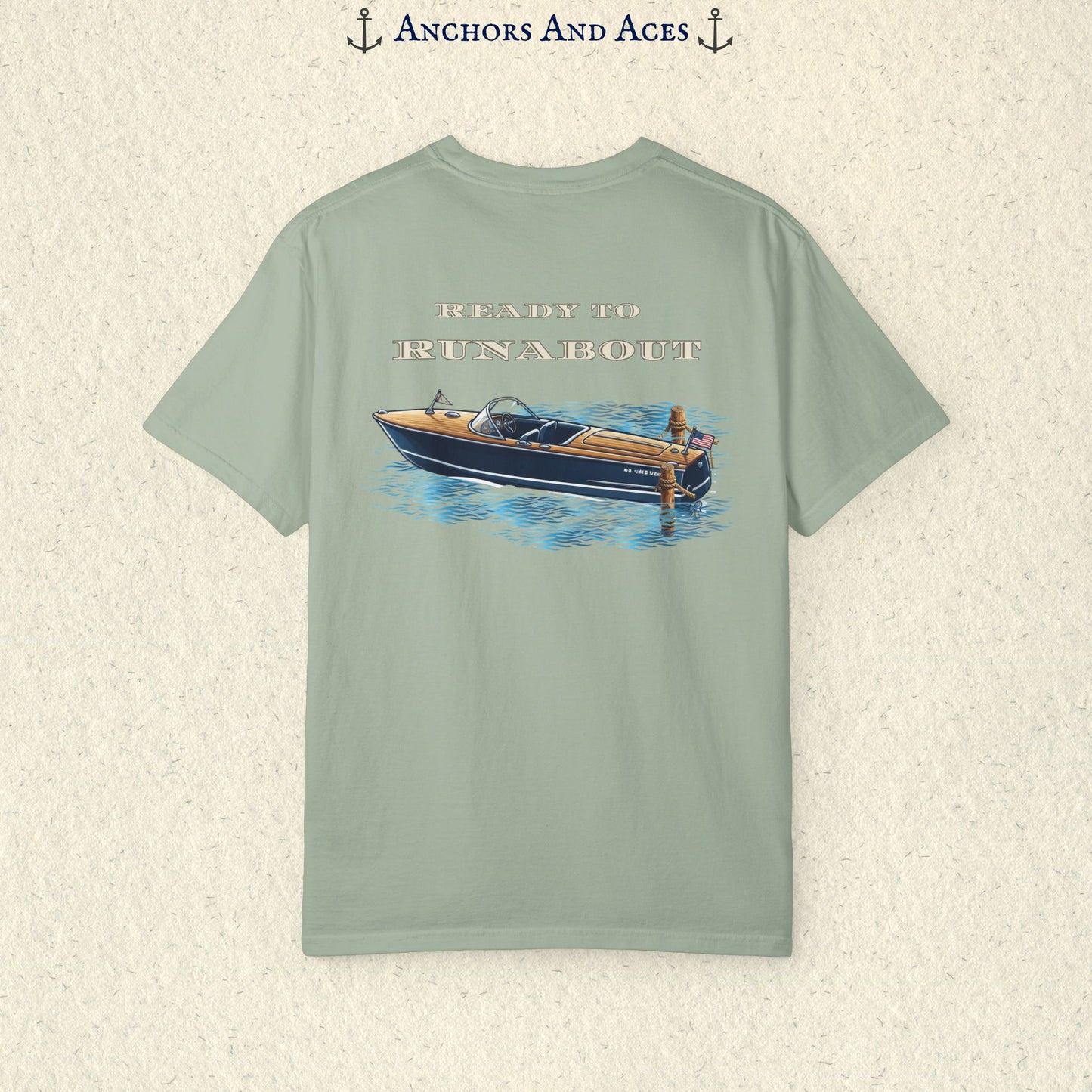 Bay classic wooden boat T-shirt shown from the back, featuring a vintage runabout on reflective blue water with Ready to Runabout text above the boat.