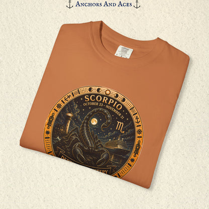 Folded Scorpio zodiac shirt close-up showing scorpion celestial medallion and Depths of Mystery artwork