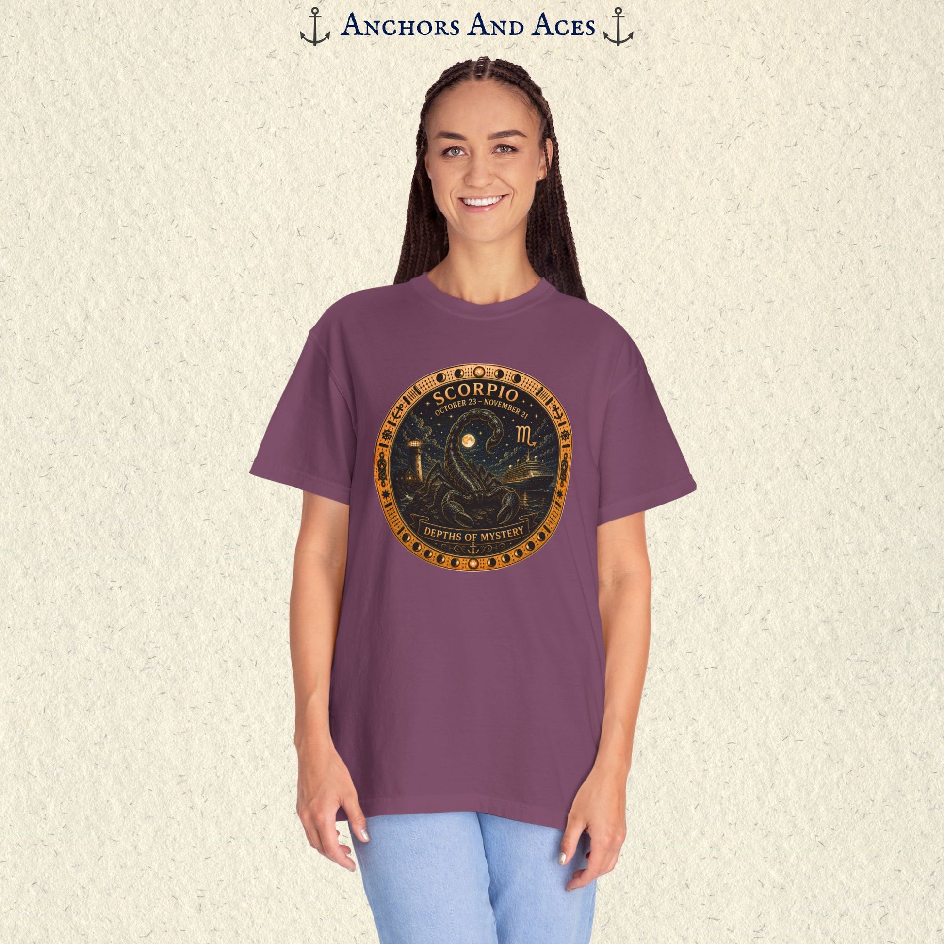 Female model wearing Scorpio zodiac shirt with scorpion celestial medallion front graphic