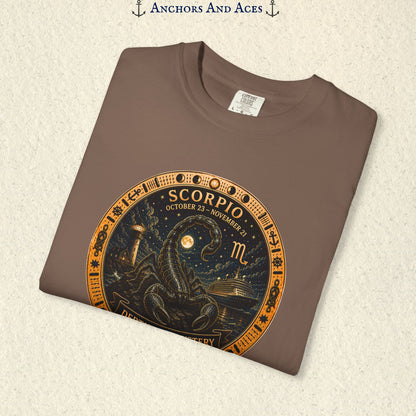 Folded Scorpio zodiac shirt close-up showing scorpion celestial medallion and Depths of Mystery artwork