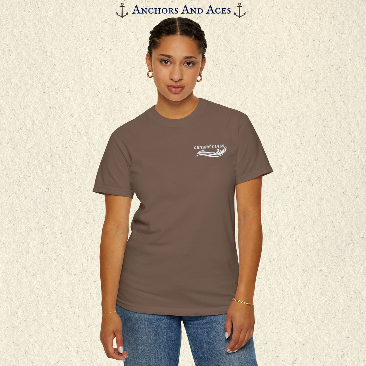 Model wearing a Espresso brown vintage water ski T-shirt, front view, with the small white Chasin' Glass text and stylized water splash logo on the left chest.