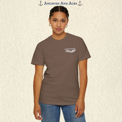 Model wearing a Espresso brown vintage water ski T-shirt, front view, with the small white Chasin' Glass text and stylized water splash logo on the left chest.