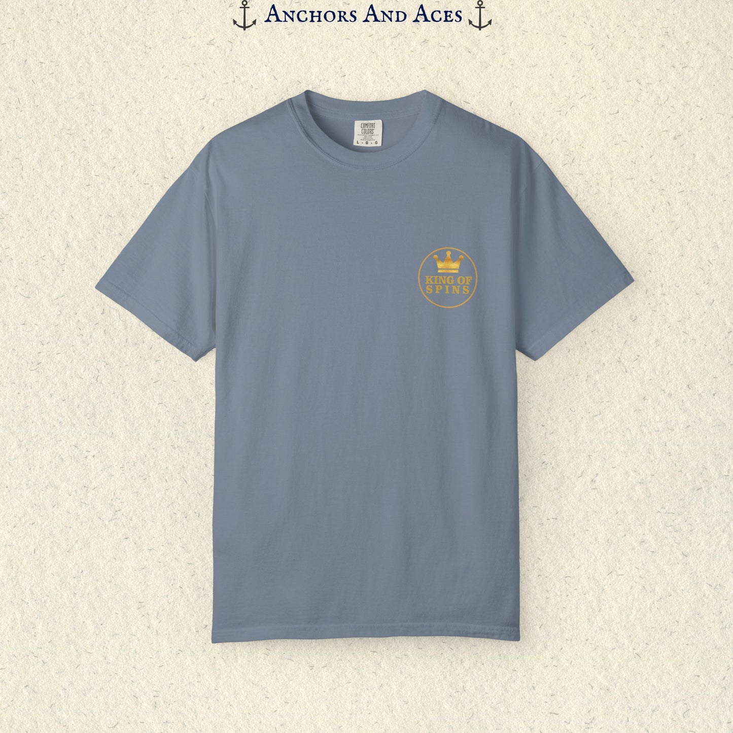 Blue Jean Slot King T-shirt with a small gold King of Spins emblem on the front chest.
