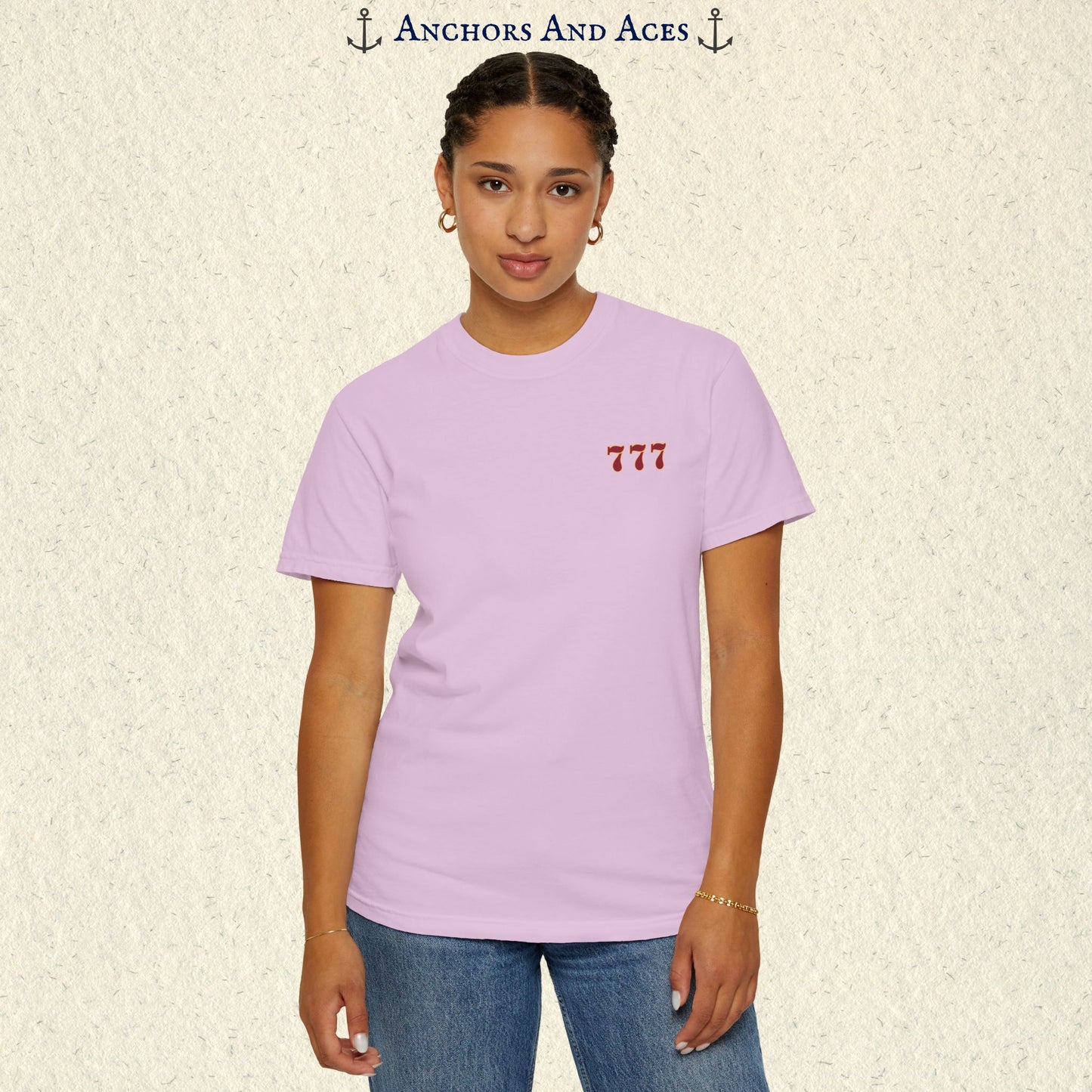 Model wearing a Orchid Lucky 777s T-shirt with the small red 777 casino emblem on the front chest.