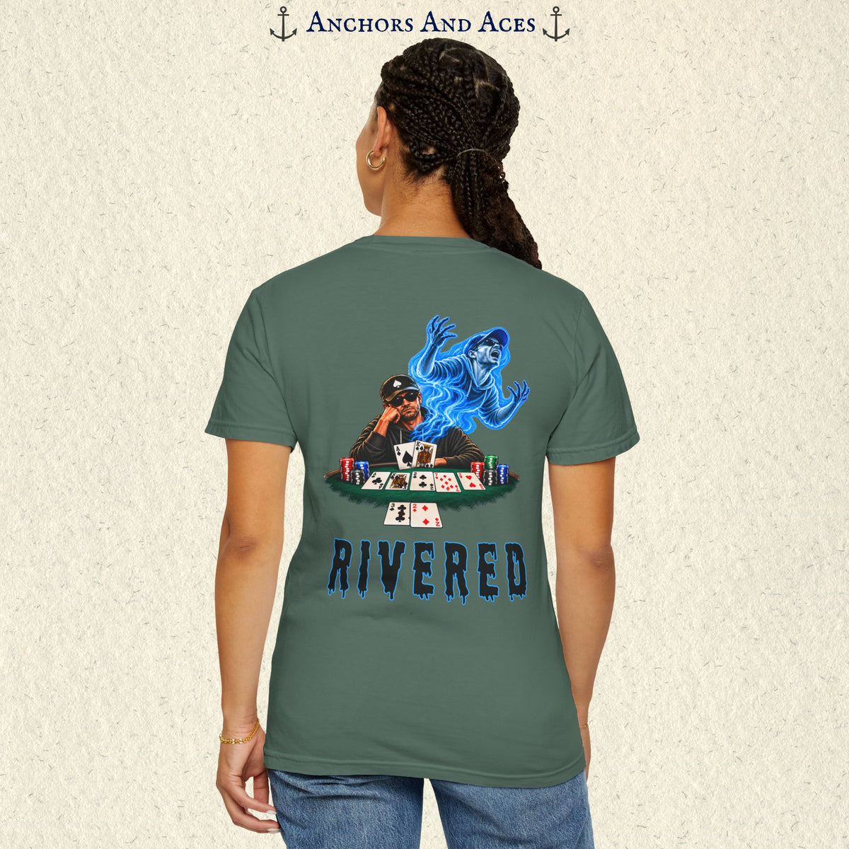 Model wearing RIVERED Texas Hold'em poker graphic tee back view featuring a player at a poker table with playing cards, poker chips, and an electric blue soul rising from his body after a bad beat on the river.  Comfort Colors 1717