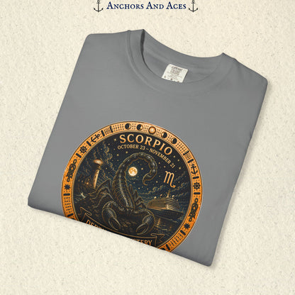 Folded Scorpio zodiac shirt close-up showing scorpion celestial medallion and Depths of Mystery artwork