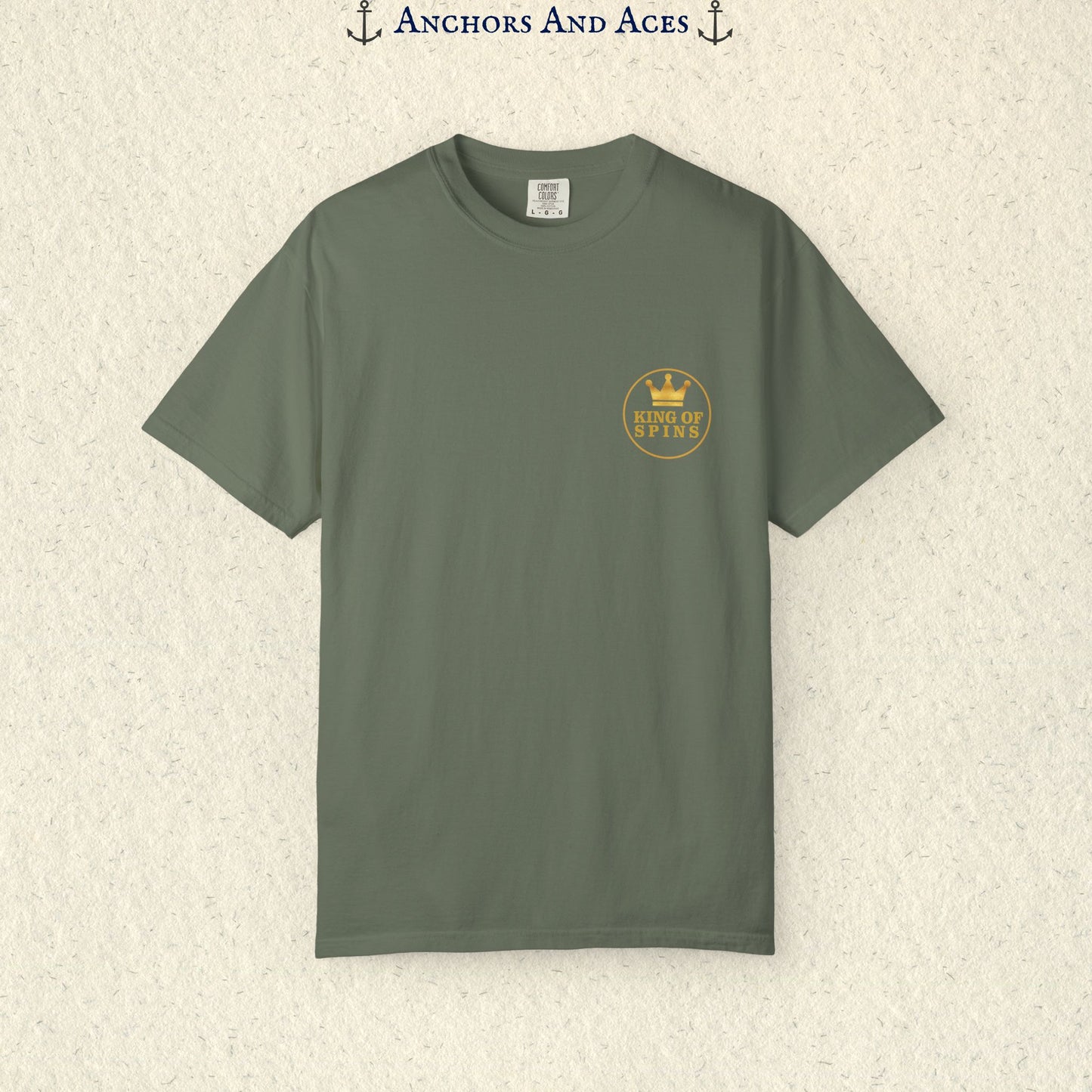 Moss Slot King T-shirt with a small gold King of Spins emblem on the front chest.