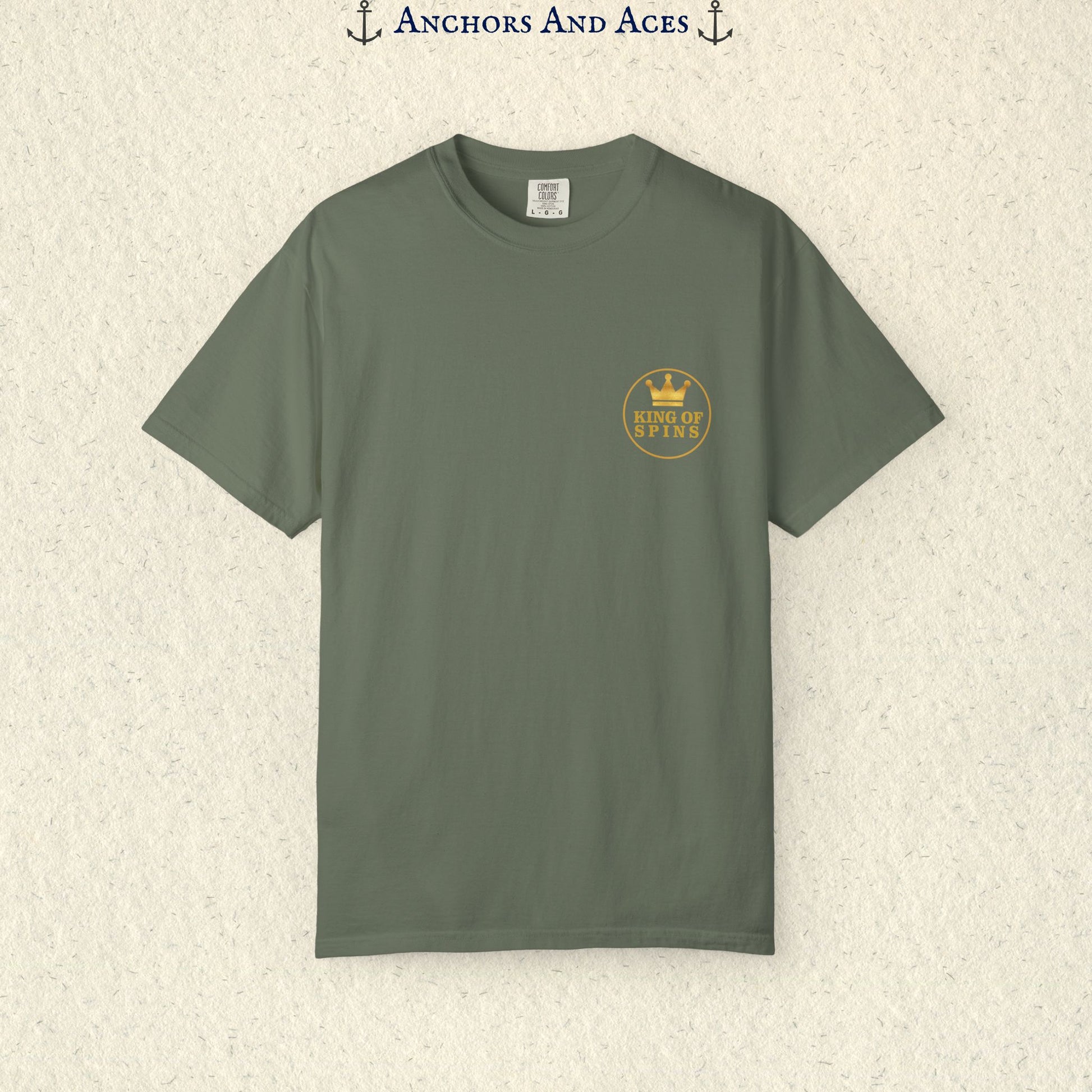 Moss Slot King T-shirt with a small gold King of Spins emblem on the front chest.