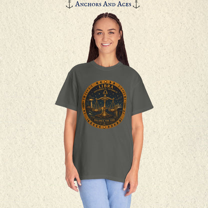Female model wearing the Libra Zodiac Shirt with the full-size balance scales celestial medallion graphic on the front.
