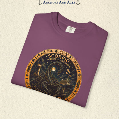Folded Scorpio zodiac shirt close-up showing scorpion celestial medallion and Depths of Mystery artwork