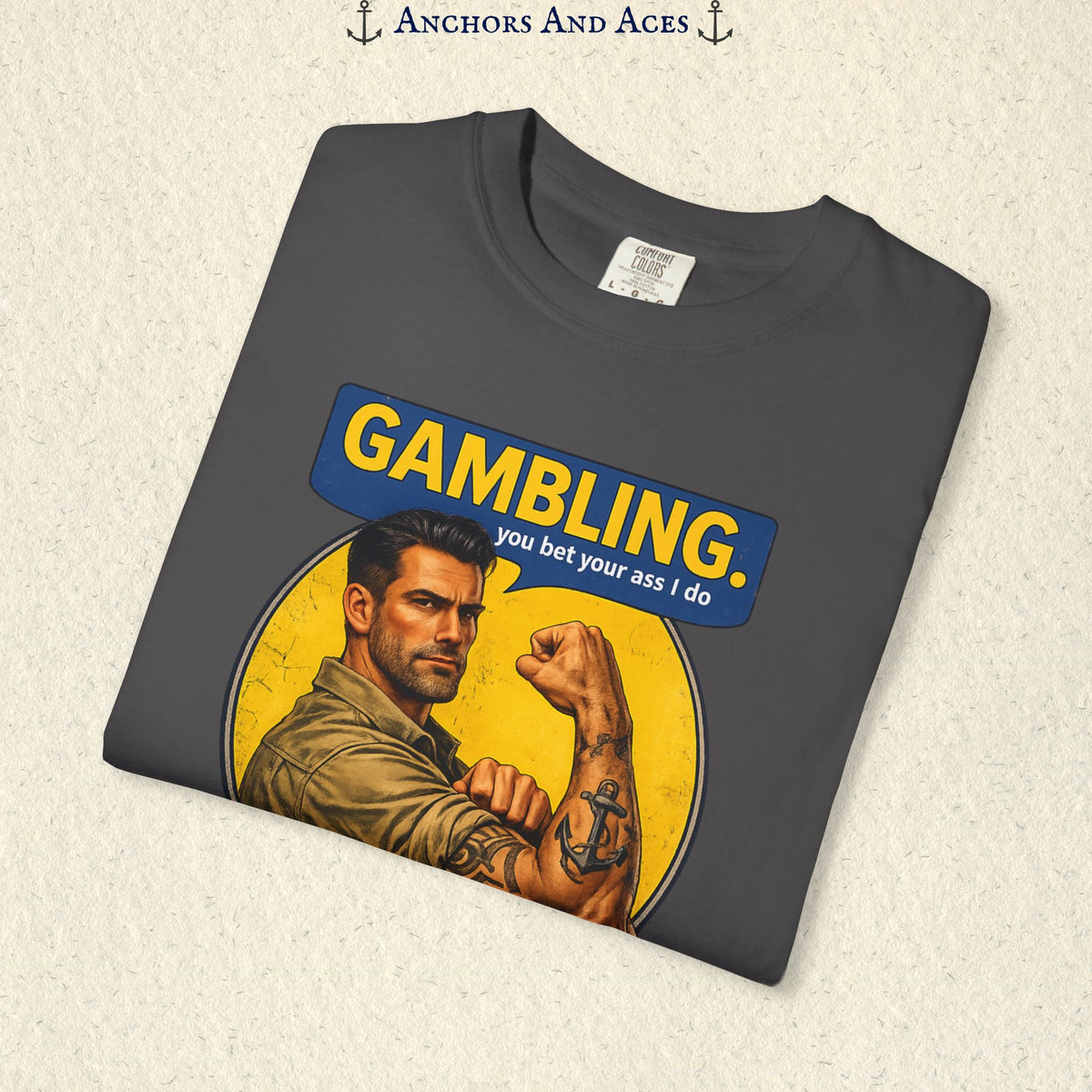 Folded Pepper funny gambling T-shirt showing the retro strongman flexing beneath bold GAMBLING text.