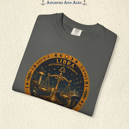 Folded Libra Zodiac Shirt close-up showing the balance scales celestial medallion front graphic.