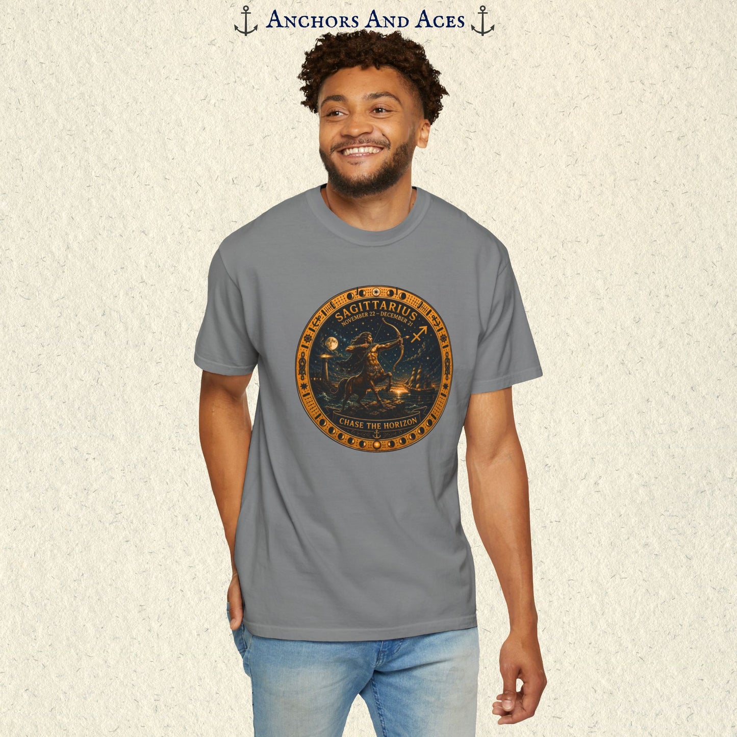 Male model standing in the Sagittarius Zodiac Shirt with the full centaur archer zodiac medallion visible on the front.