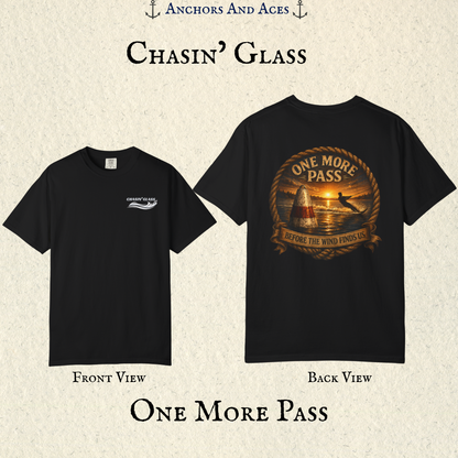 Front and back mockup of a black vintage slalom water ski shirt. The front has a small white Chasin' Glass water splash logo, and the back features a sunrise lake scene with a slalom buoy, water skier, rope border, and the text One More Pass and Before the Wind Finds Us.