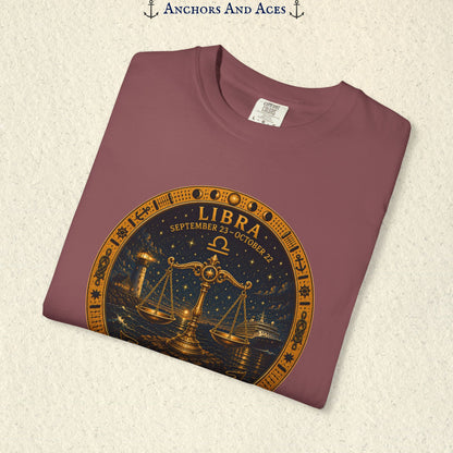 Folded Libra Zodiac Shirt close-up showing the balance scales celestial medallion front graphic.