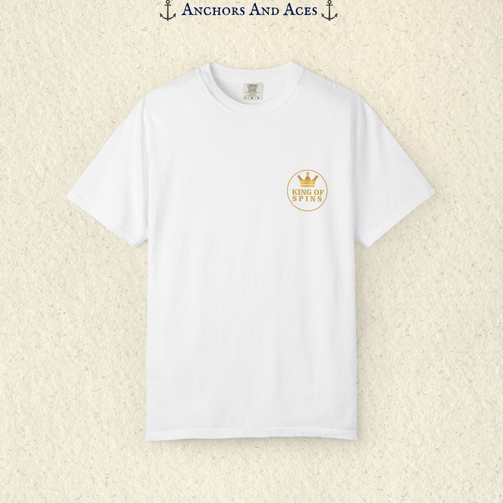 White Slot King T-shirt with a small gold King of Spins emblem on the front chest.