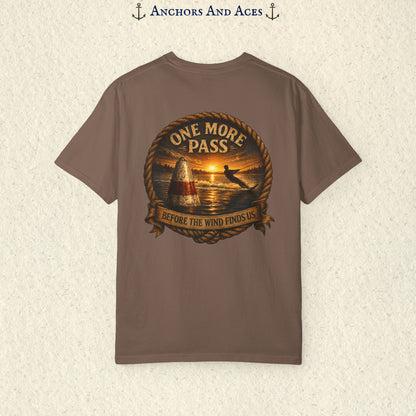 Espresso brown vintage slalom water ski T-shirt shown from the back with a sunrise lake graphic featuring a slalom buoy, water skier, rope border, and the text One More Pass and Before the Wind Finds Us.