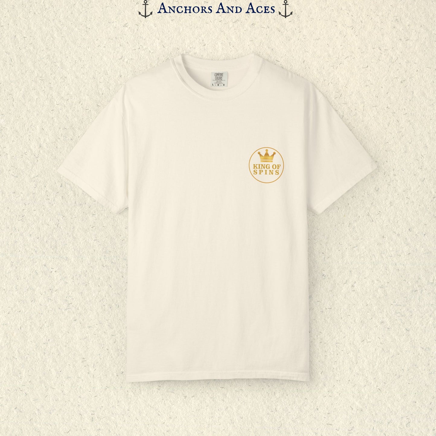 Ivory Slot King T-shirt with a small gold King of Spins emblem on the front chest.