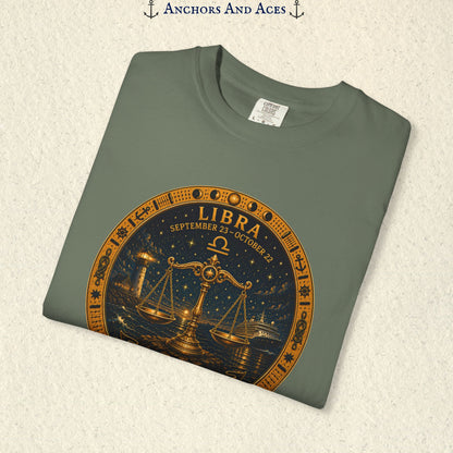 Folded Libra Zodiac Shirt close-up showing the balance scales celestial medallion front graphic.