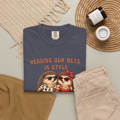 Custom casino trip shirt shown in a styled flat lay with illustrated hedgehog couple, gambling details, and personalized text.