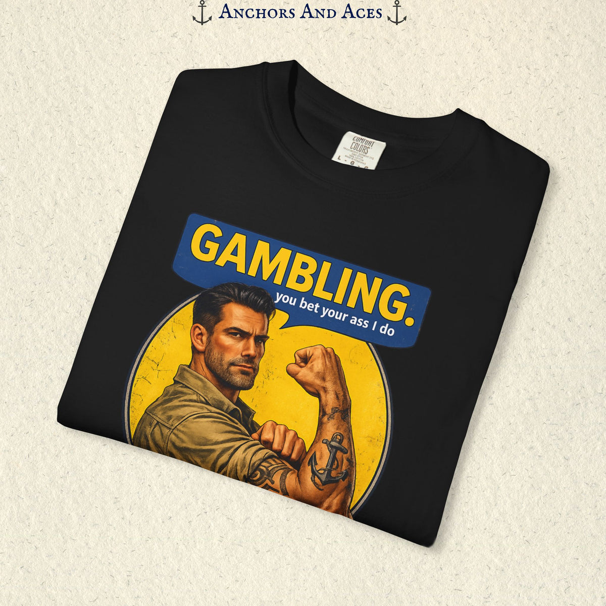 Folded Black funny gambling T-shirt showing the retro strongman flexing beneath bold GAMBLING text.