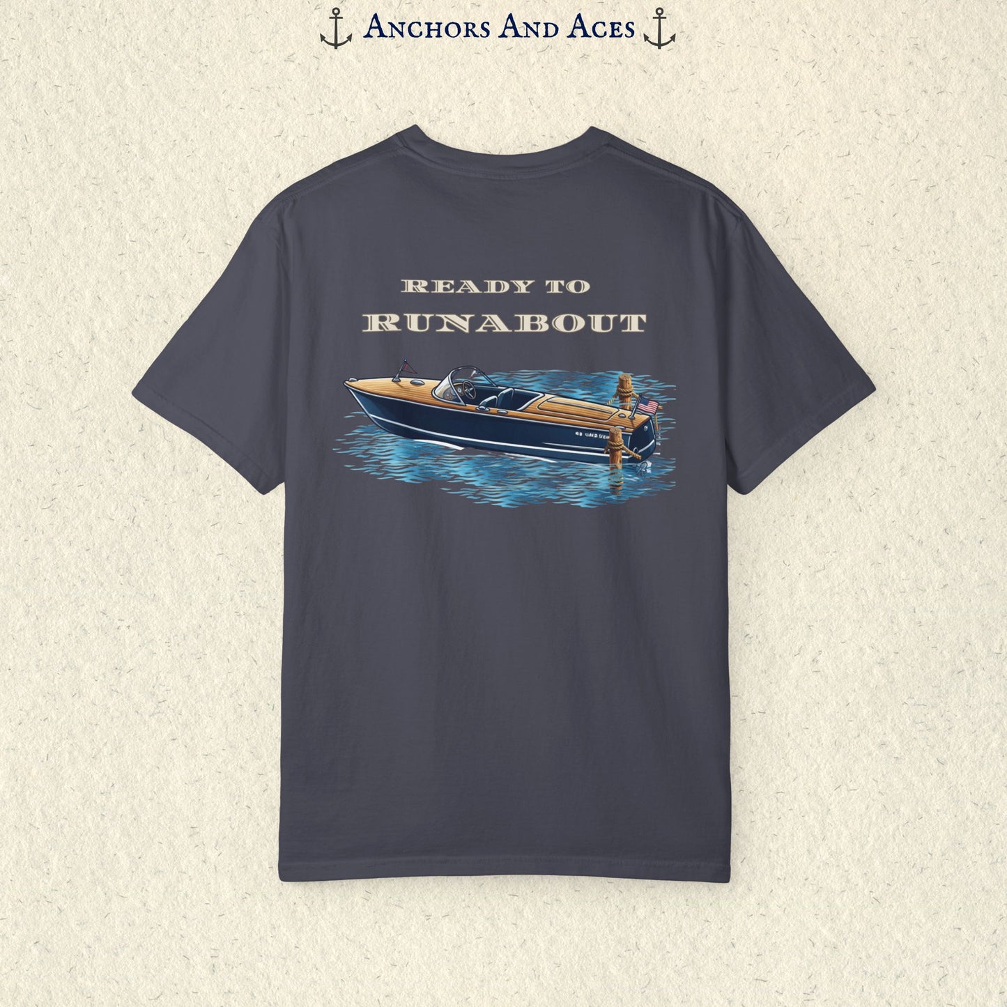 Navy classic wooden boat T-shirt shown from the back, featuring a vintage runabout on reflective blue water with Ready to Runabout text above the boat.