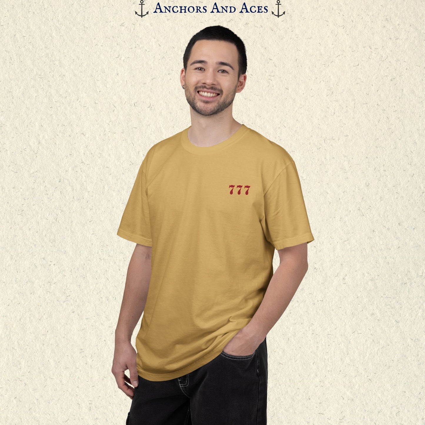 Model wearing a Mustard Lucky 777s T-shirt with the small red 777 casino emblem on the front chest.