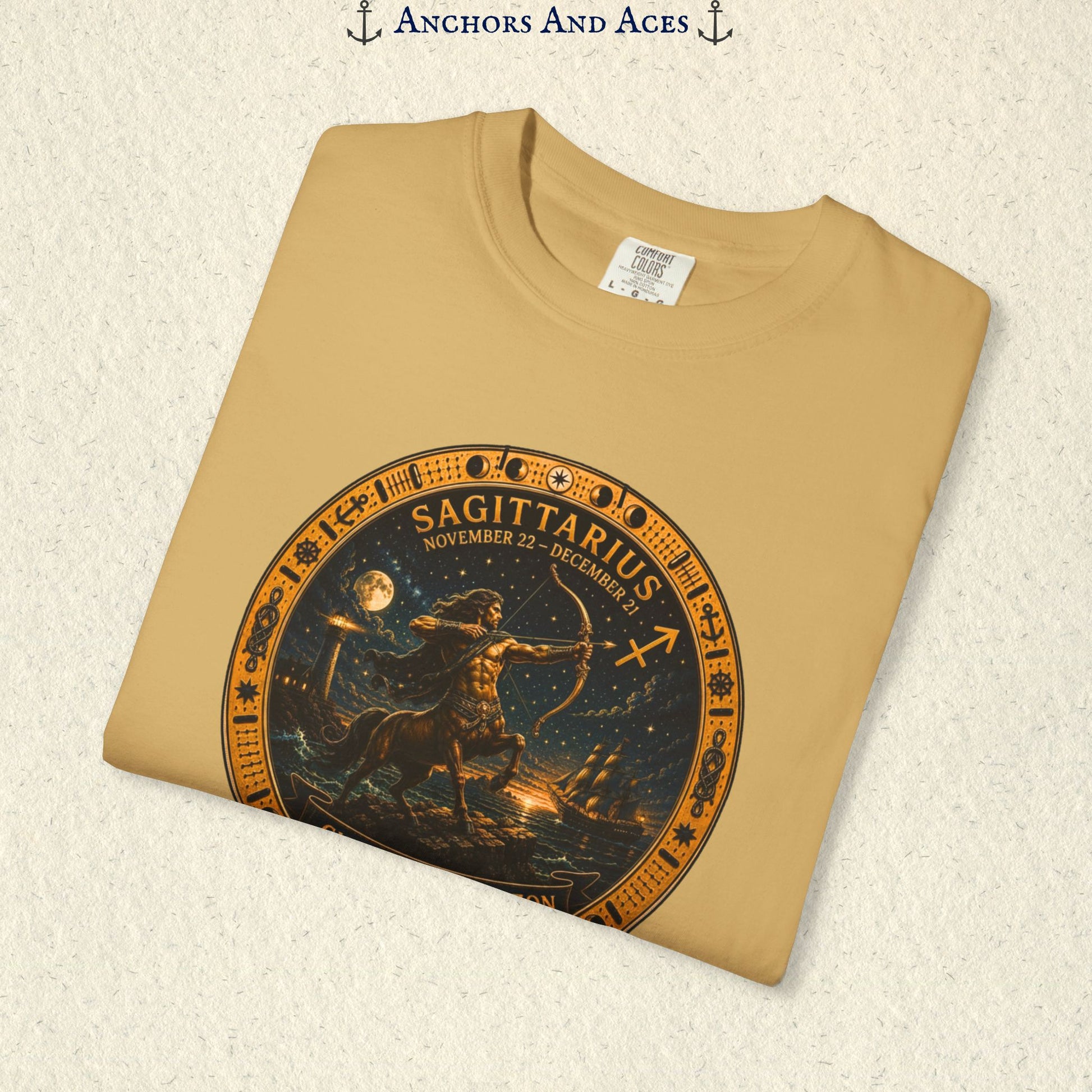 Folded Sagittarius Zodiac Shirt close-up showing the centaur archer, celestial background, and Chase the Horizon text.