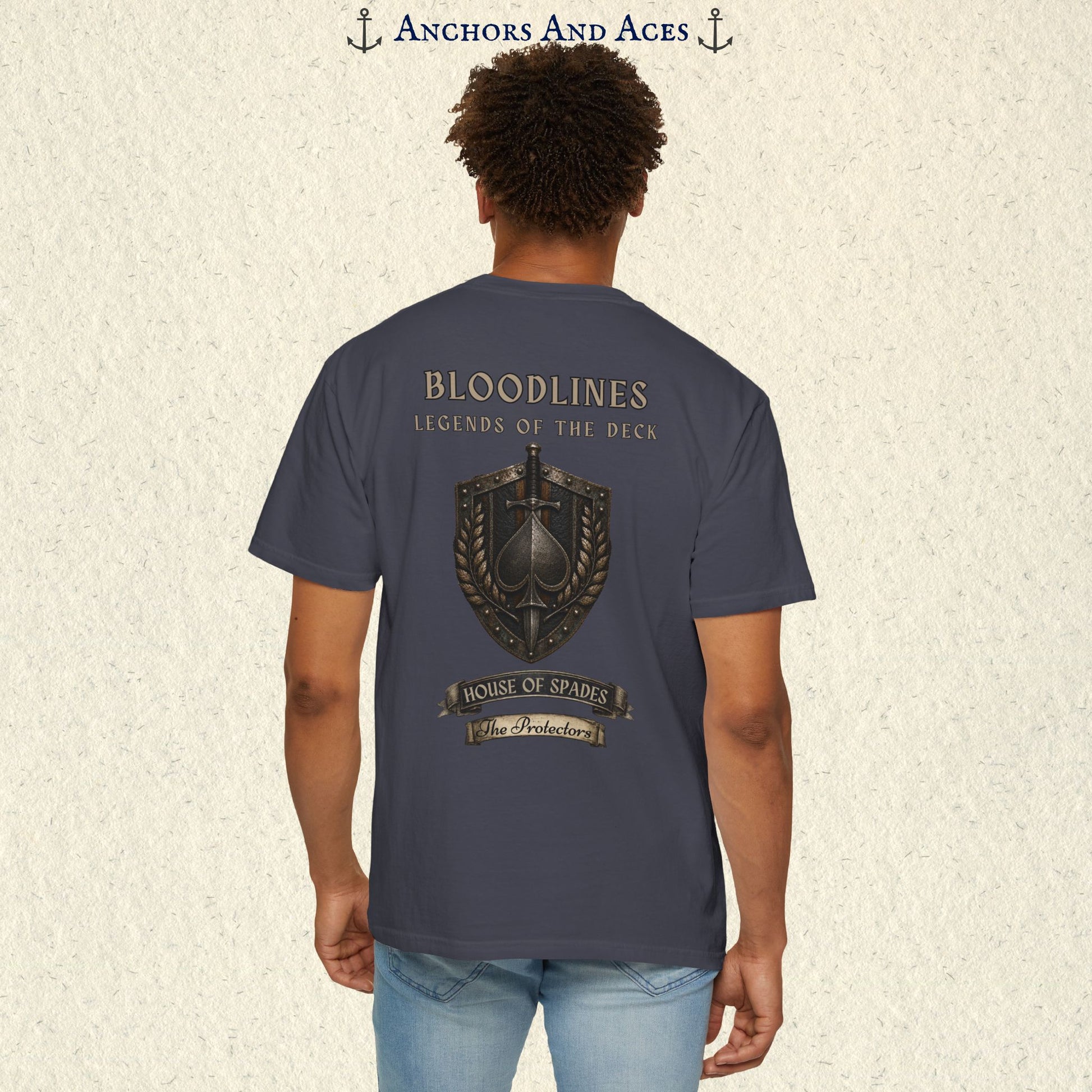 Back view of House of Spades playing card shirt on a male model featuring the medieval-inspired Protectors crest.