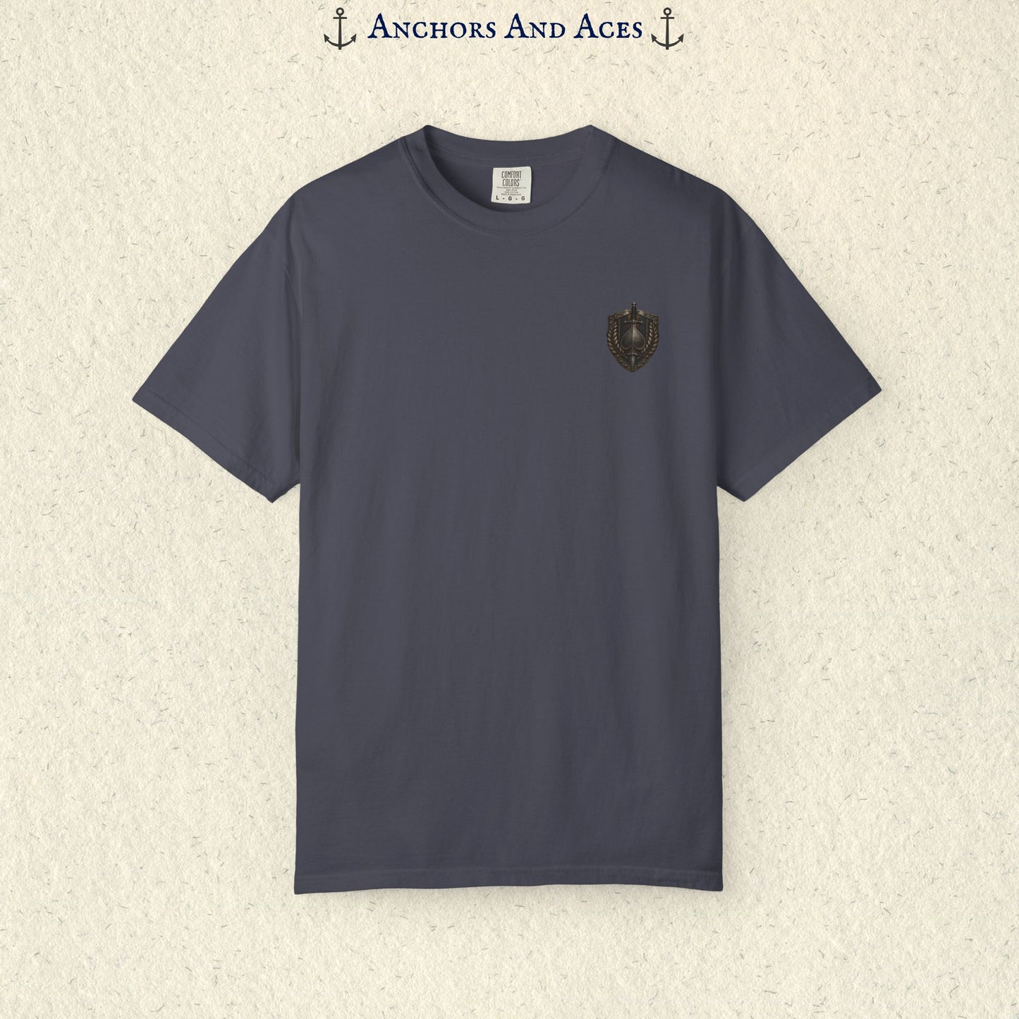 Front view of House of Spades graphic tee showing the small heraldic crest emblem on the chest.