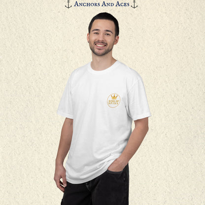 Man wearing a White Slot King T-shirt with the small gold King of Spins emblem on the front.