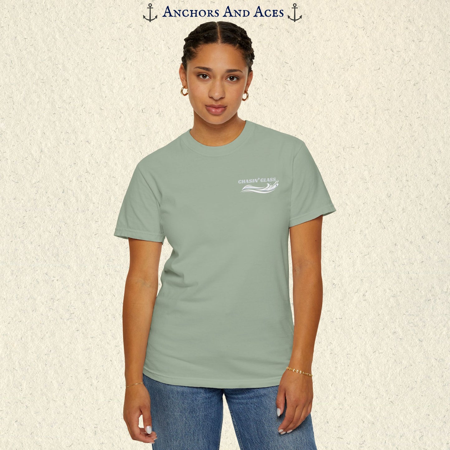 Model wearing a Bay T-shirt from the front, showing the small white Chasin' Glass water splash logo on the left chest.