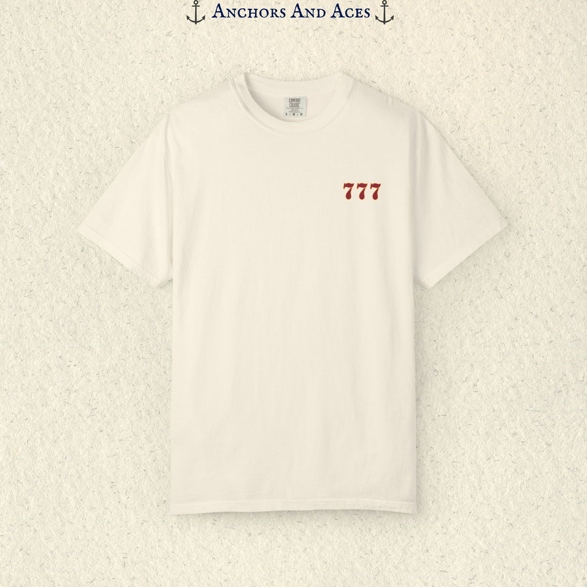 Ivory Lucky 777s T-shirt with colorful vintage casino jackpot artwork and Lucky 7s design printed on the back.