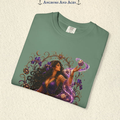Close-up of Goddess of Chance Art Nouveau graphic on Bay Comfort Colors tee with illustrated goddess, dice, irises, and gold filigree.