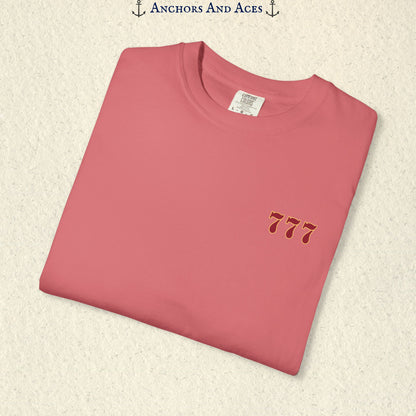 Folded Watermelon Lucky 777s T-shirt showing the small red 777 casino emblem on the front chest.