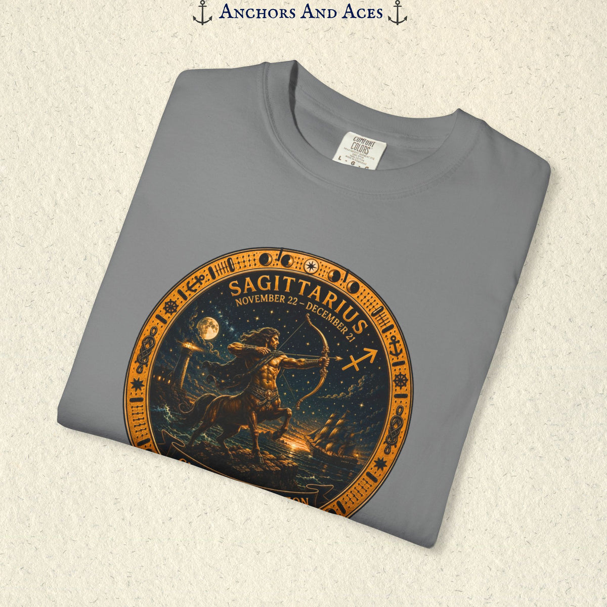 Folded Sagittarius Zodiac Shirt close-up featuring the centaur archer and detailed zodiac medallion print.