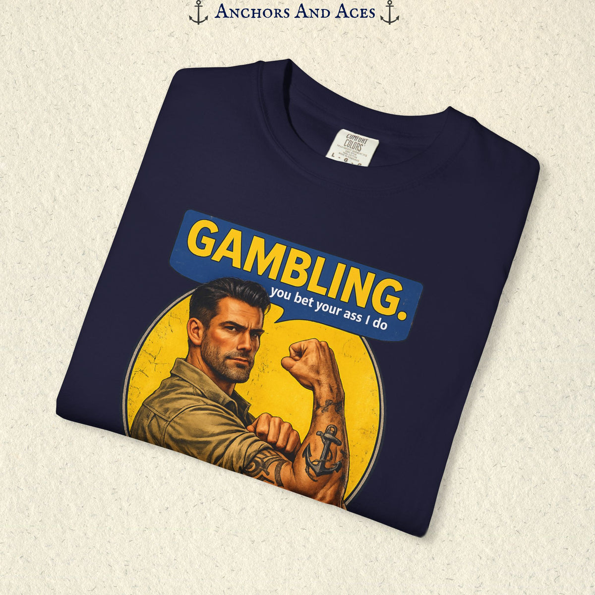 Folded True Navy funny gambling T-shirt showing the retro strongman flexing beneath bold GAMBLING text.