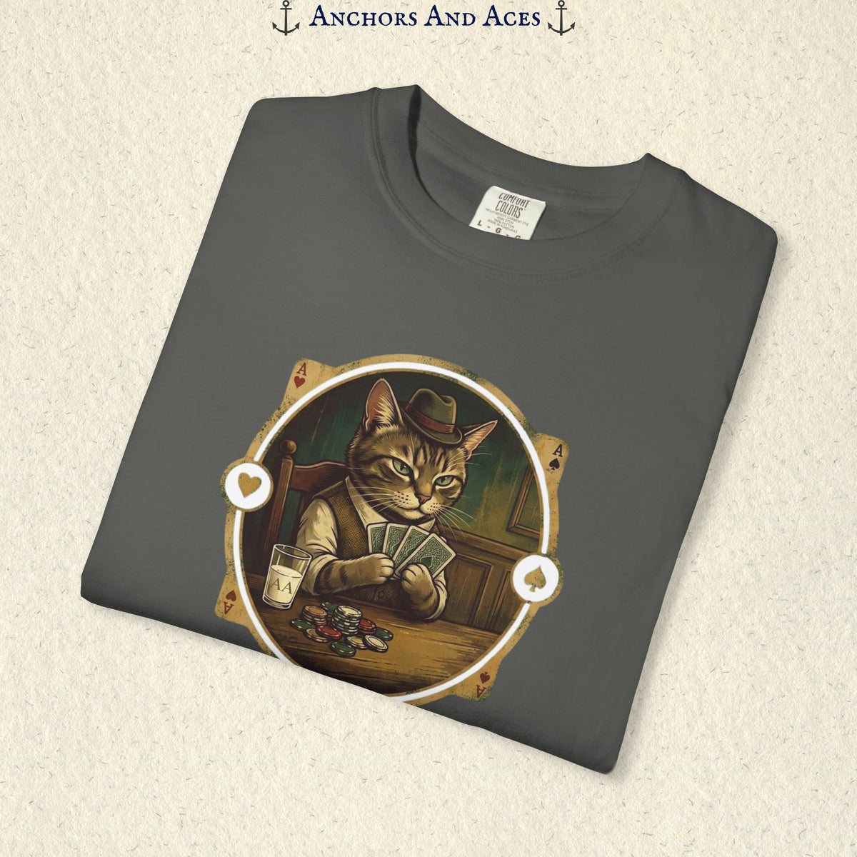 Folded vintage poker cat shirt showing the card-playing cat, poker chips, and retro casino artwork.