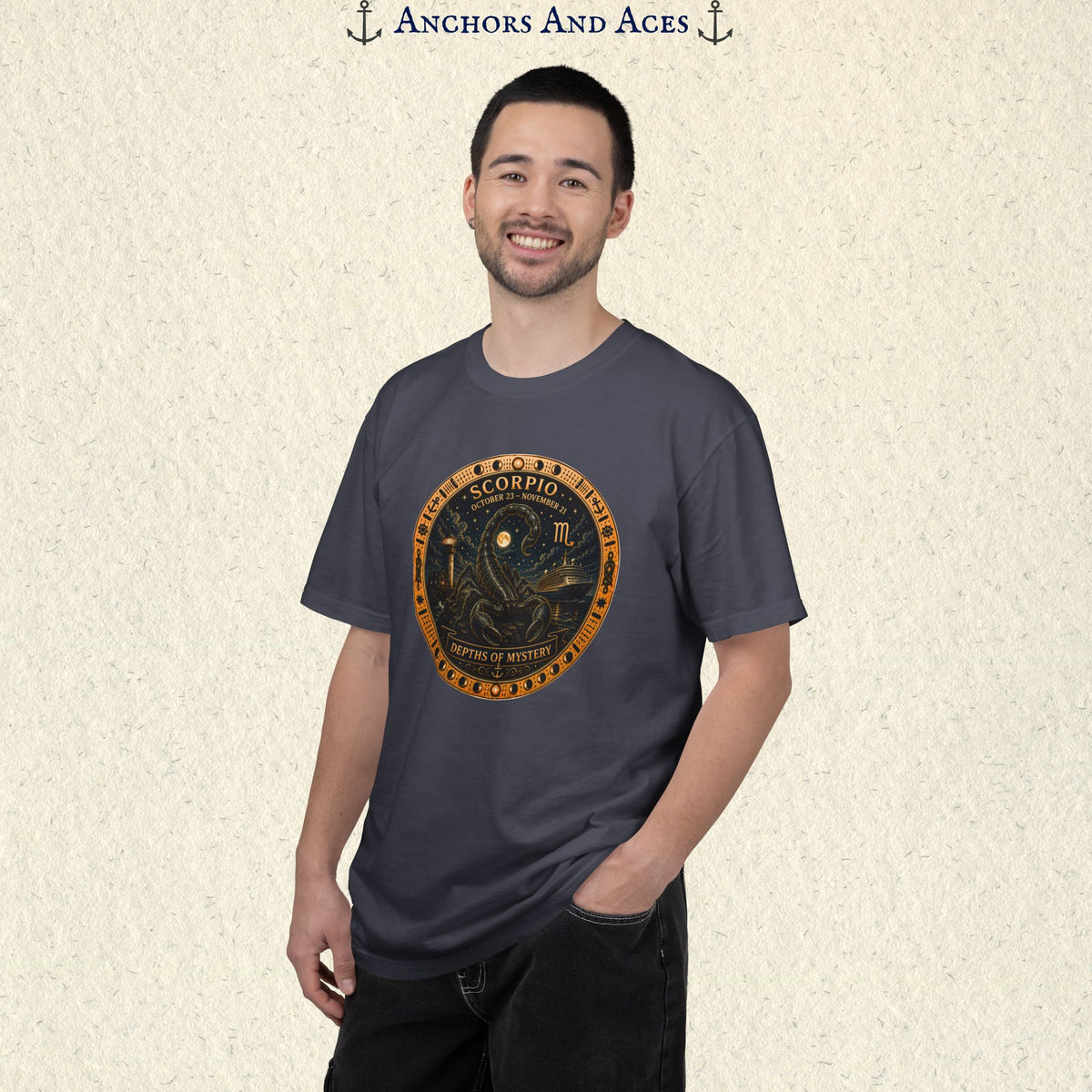 Male model standing in Scorpio zodiac shirt with scorpion celestial medallion front graphic