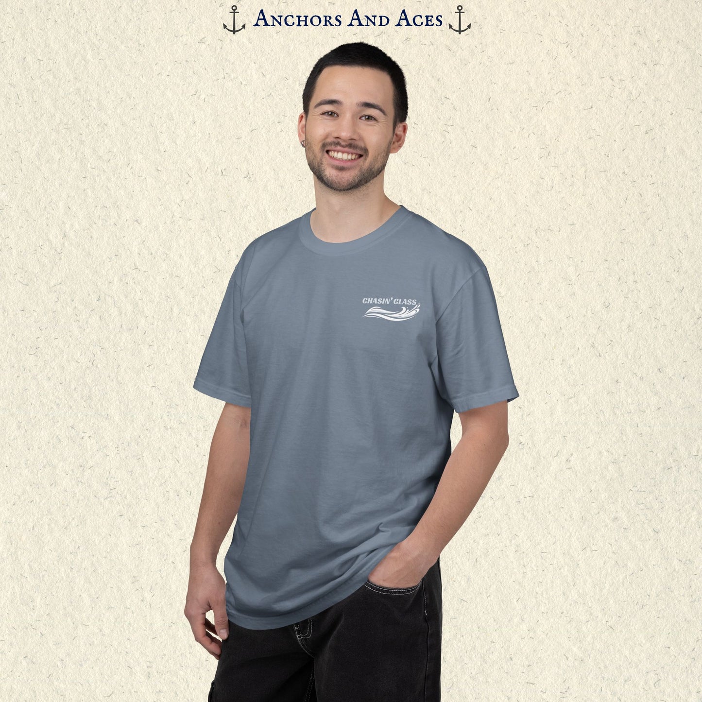 Model wearing a Blue Jean Comfort Colors 1717 water ski t-shirt from the front, showing the small white Chasin' Glass water-splash logo on the left chest.