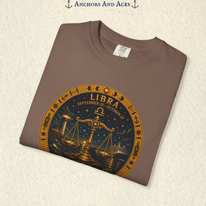 Folded Libra Zodiac Shirt close-up showing the balance scales celestial medallion front graphic.